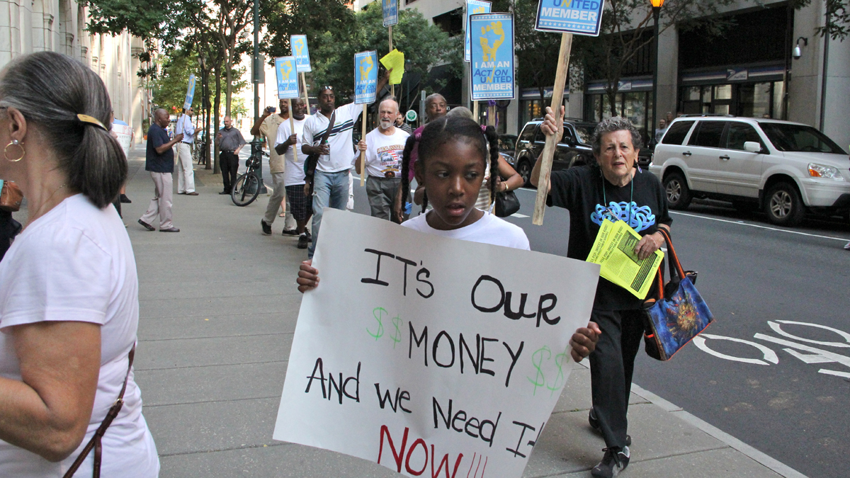  Amani Bassett, 9, marches with Action United outside the offices of the Philadelphia School Partnership on Chestnut Avenue. (Emma Lee/for NewsWorks) 
