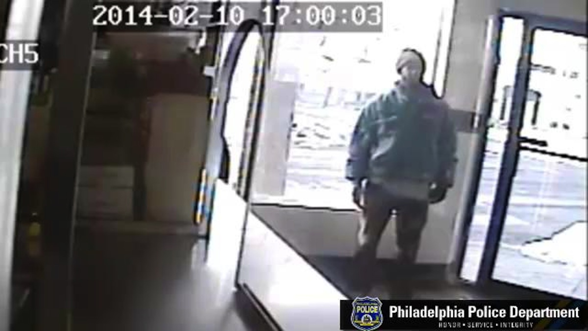  Surveillance image of the unknown suspect in a Monday afternoon purse snatching in Germantown. (Courtesy of Philadelphia Police) 