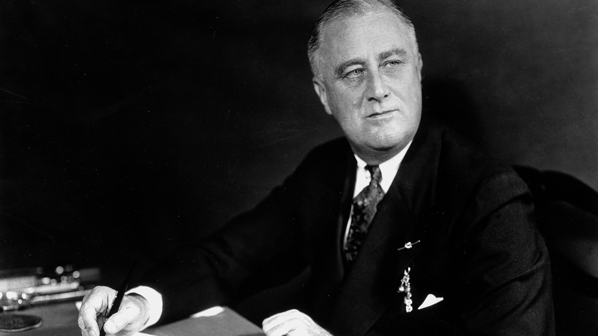  U.S. President Franklin D. Roosevelt is seen on the eve of his inauguration for a second term on Jan. 19, 1937, at his desk in the White House in Washington.  (AP Photo) 