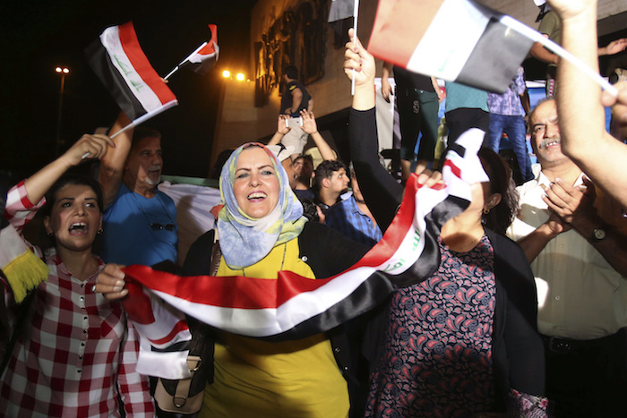 Iraqis celebrate in Tahrir square