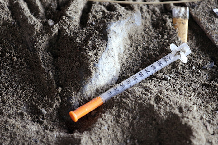 a discarded syringe