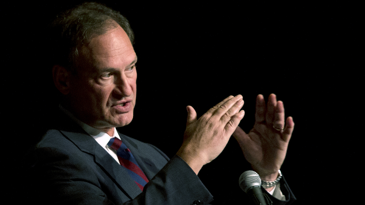  U.S. Supreme Court Justice Samuel Alito, who wrote the majority opinion in the Hobby Lobby decision, is shown speaking in in Florida in February. During the speech, Alito said that the nine justices would undermine the court's standing if they were concerned about public opinion. (AP Photo/Wilfredo Lee, file) 