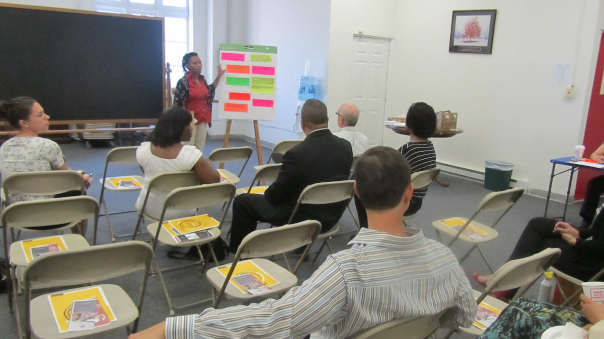  Representatives of community groups in Germantown and other Northwest Philadelphia neighborhoods gathered at state Rep. Stephen Kinsey's office for a confab on Thursday. (Aaron Moselle/WHYY) 