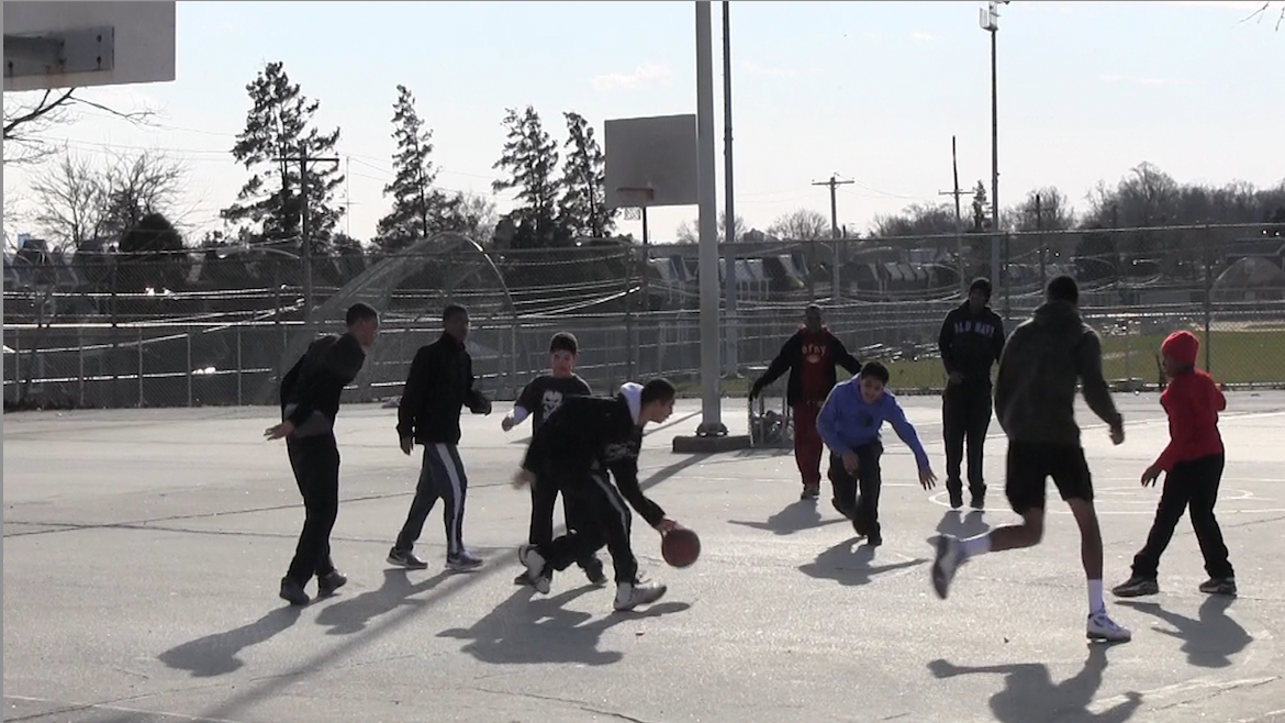  Teens playing hoops at the Simons Rec Center in West Oak Lane. (Solomon Jones/for NewsWorks) 