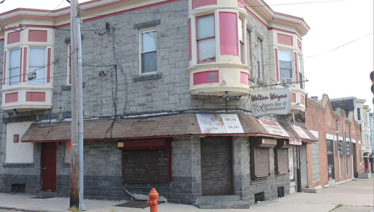  The owner of this shuttered Germantown bar was fatally shot in West Oak Lane. A neighboring business owner wants to reopen the establishment. (Matthew Grady/for NewsWorks) 