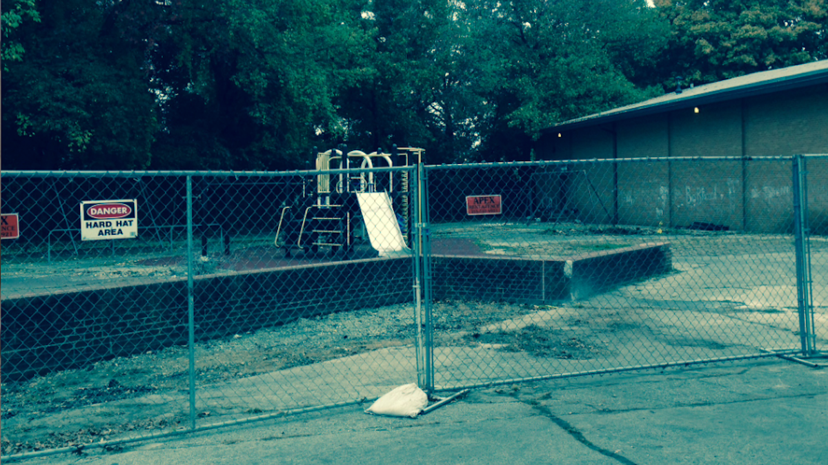  The playground at McDevitt Rec Center in East Falls was fenced off prior to the start of a $300,000 improvement project. (Brian Hickey/WHYY) 