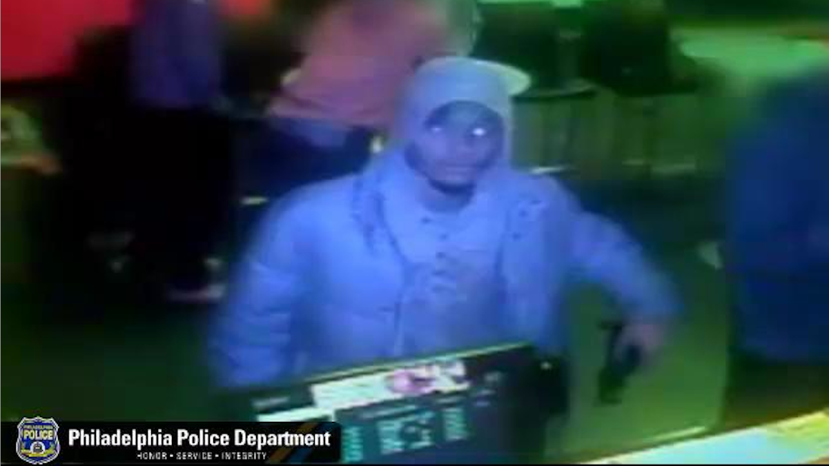  Surveillance footage of a gunman who fled a West Oak Lane Pizza Hut after seeing the cash register was empty. (Courtesy of Philadelphia Police) 