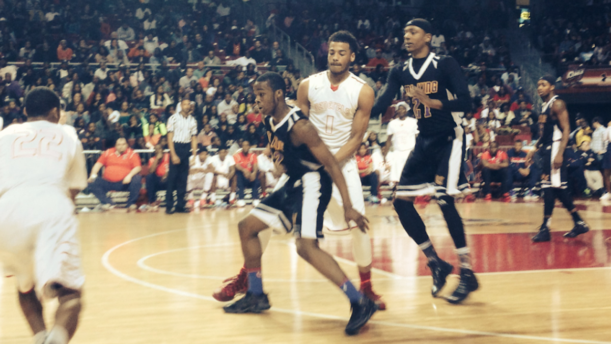  MLK High's Jabri McCall (center) was named MVP of Sunday's Public League championship game. (Brian Hickey/WHYY) 