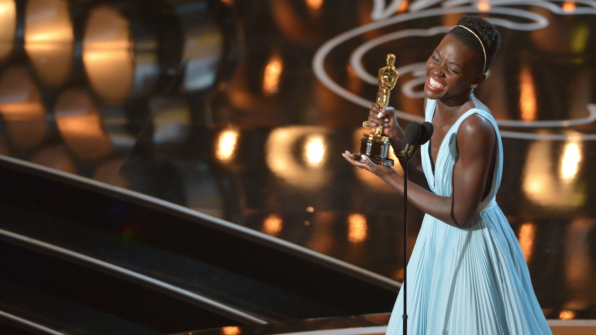   Lupita Nyong’o accepts the award for best actress in a supporting role for 