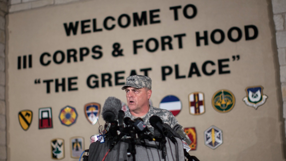  Lt. Gen. Mark Milley, commanding general of III Corps and Fort Hood, speaks with the media outside of an entrance to the Fort Hood military base following a shooting that occurred inside, Wednesday, April 2, 2014, in Fort Hood, Texas. Four people were killed, including the gunman, and 16 were wounded in the attack, authorities said. (AP Photo/Tamir Kalifa) 