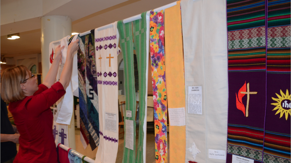  FUMCOG Pastor Lorelei Toombs said she hopes the exhibit will challenge people to consider those who have lived in secret for fear of being rejected by their church community.   (Jimmy Viola/for NewsWorks) 