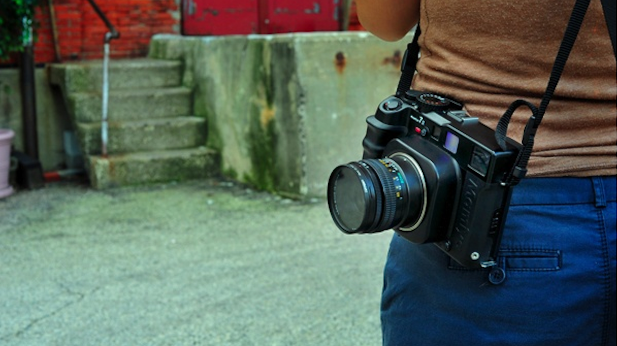  A collection of cameras accompanied the assortment of personalities on the 2012 Photo Walk, which was led by Gary Reed in lower Germantown. (Jessie Fox/for NewsWorks) 