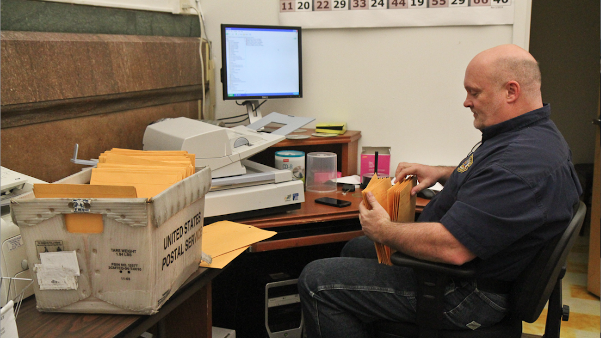  Monday's annual-report filing deadline means the Philadelphia County Board of Elections' office is rather busy. (Kimberly Paynter/WHYY) 