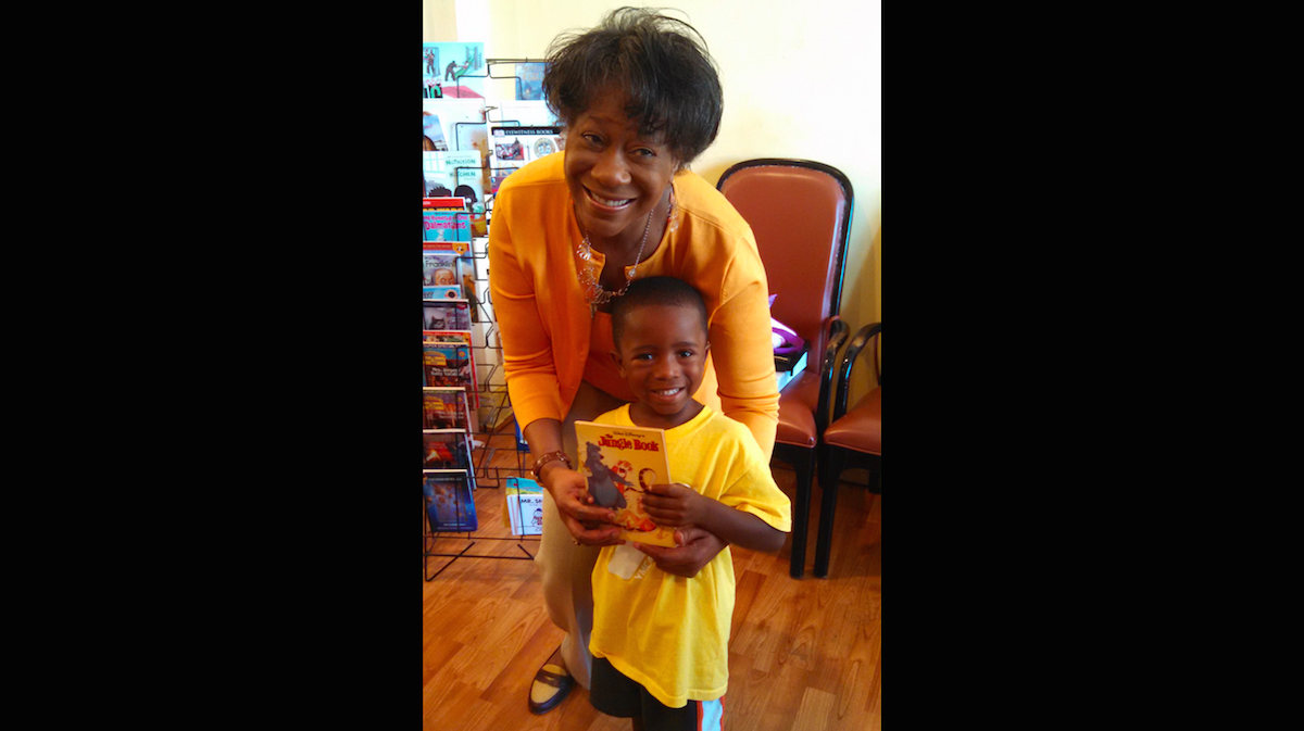 Launched by state Rep. Rosita Youngblood, the campaign provides donated books to barbershops for children to read while waiting for a trim. (John Corrigan for WHYY)