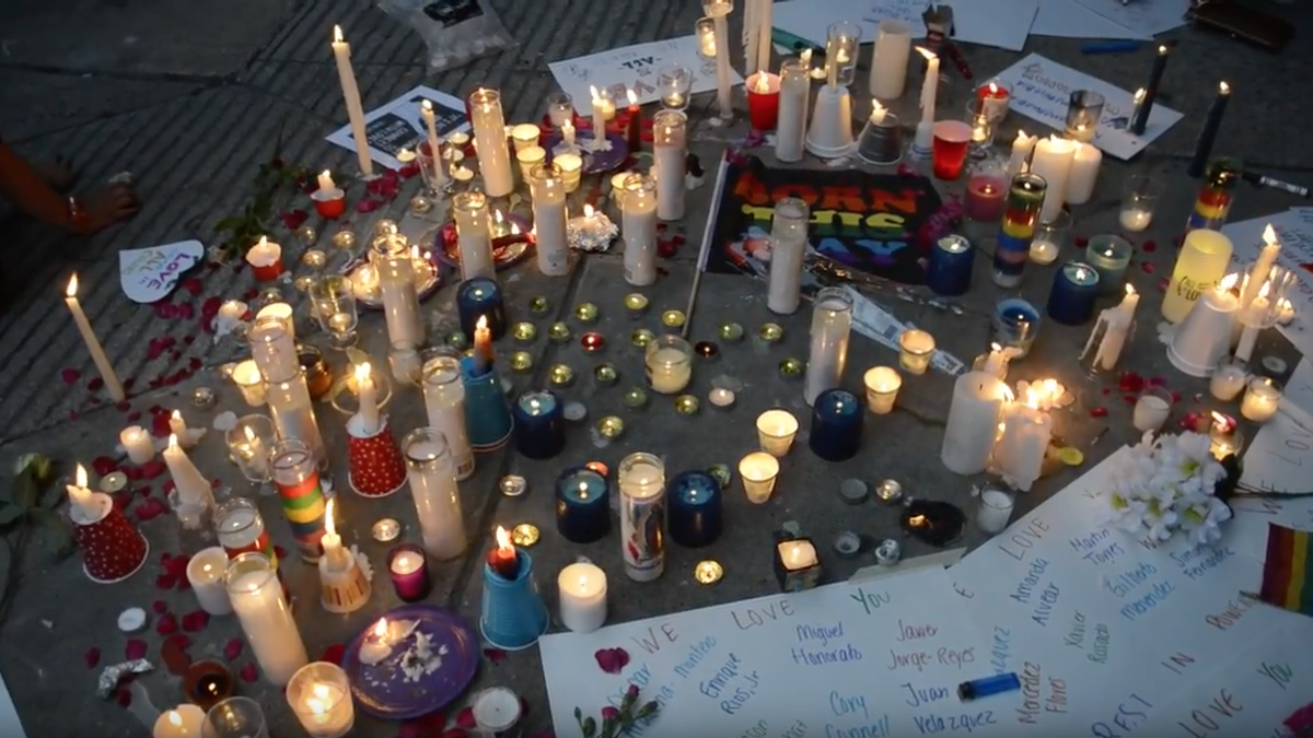 Items form a makeshift memorial at Philadelphia City Hall during a vigil on Monday night. (Dave Angilella)