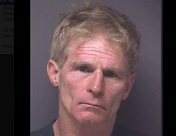  Mark E. Allan, 55, was charged with second degree luring or enticing a child and third degree endangering the welfare of a child. (Image: Ocean County Jail via Ocean County Police, Fire, and EMS on Facebook) 