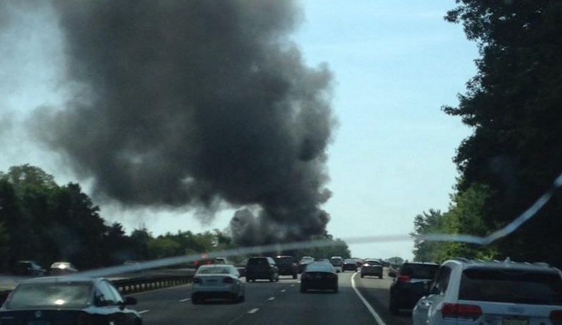  The smoke column emanating from a vehicle fire on the Garden State Parkway southbound express lane at milepost 105.5 late Monday morning. (Photo: Kyle Higham via Twitter  ‏@notoriousHIG_) 