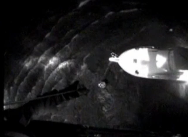  View from a Coast Guard helicopter showing a boat near where the man was discovered. (Image courtesy of the US Coast Guard) 