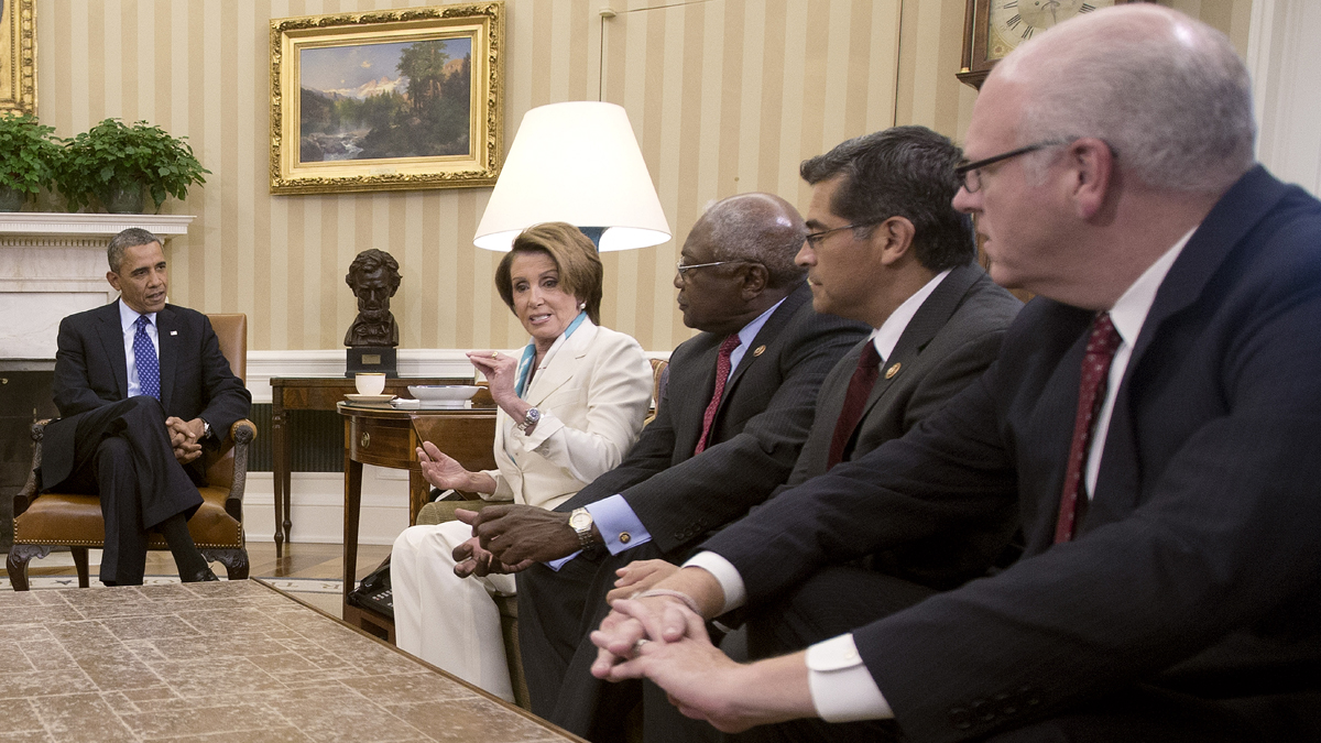  President Barack Obama, far left, is shown meeting with Democratic leadership in the Oval Office of the White House, Tuesday, Oct. 15, 2013. From left: House Minority Leader Nancy Pelosi of Calif., Rep. James Clyburn of S.C., Rep. Xavier Becerra of Calif., Rep. Joseph Crowley of N.Y. (AP Photo/Pablo Martinez Monsivais) 