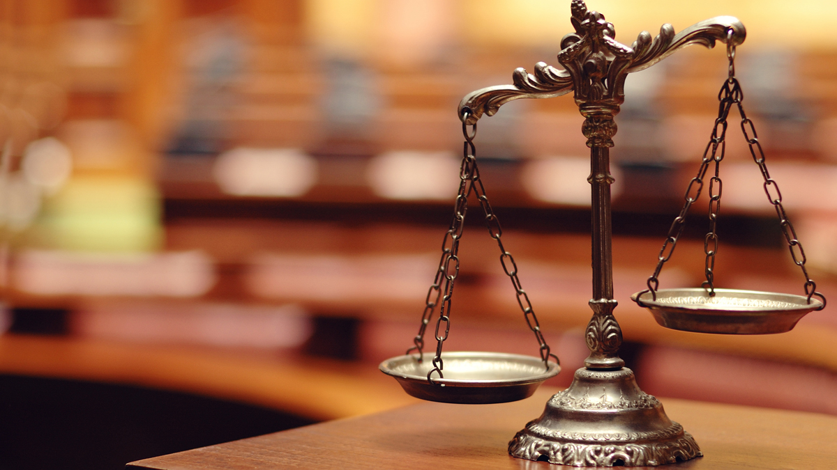(<a href='http://www.shutterstock.com/pic-140867215/stock-photo-symbol-of-law-and-justice-law-and-justice-concept.html'>Photo</a> via ShutterStock)