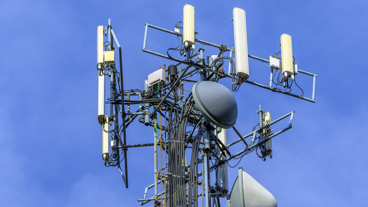  (<a href='http://www.shutterstock.com/pic-122758183/stock-photo-telecommunications-equipment-directional-mobile-phone-antenna-dishes-wireless-communication.html'>Cell tower</a> image courtesy of Shutterstock.com) 