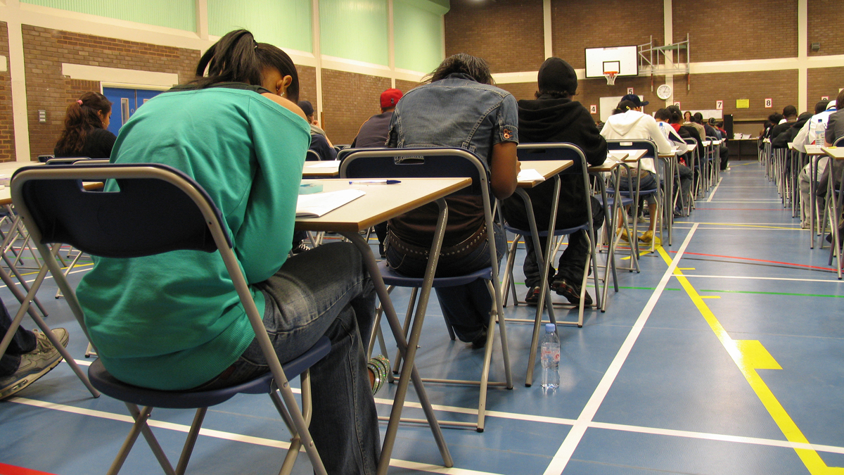Students hard at work</a> image courtesy of Shutterstock.com