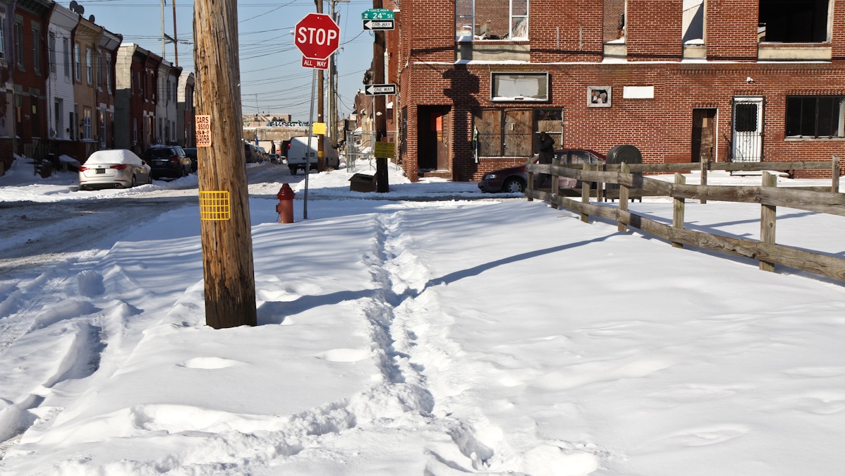  A sidewalk is not shoveled in South Philadelphia Thursday morning. (Kimberly Paynter/WHYY) 