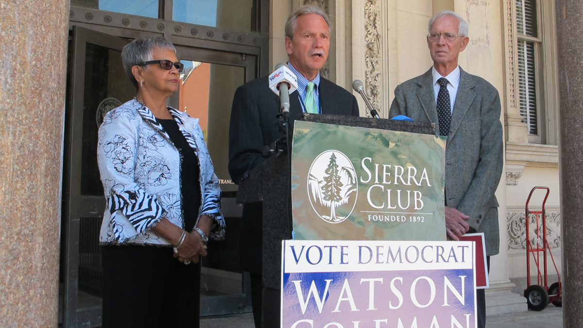  New Jersey Sierra Club director Jeff Tittel, center, announces the Sierra Club's endorsement of Assemblywoman Bonnie Watson Coleman for Congress on the  steps of the Statehouse in Trenton.(Phil Gregory/WHYY) 
