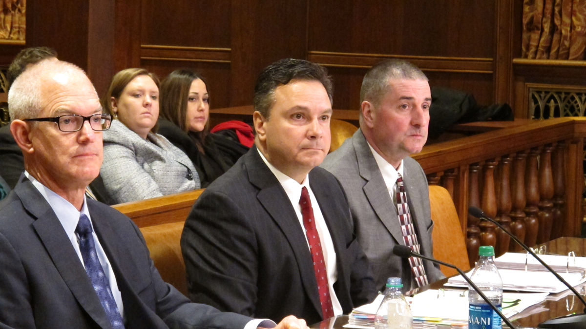  DEP Secretary Chris Abruzzo (center) with with deputy secretaries Jeff Logan (left) and Dana Aunkst (right) at the department's senate budget hearing in Harrisburg (Marie Cusick/StateImpact Pennsylvania) 