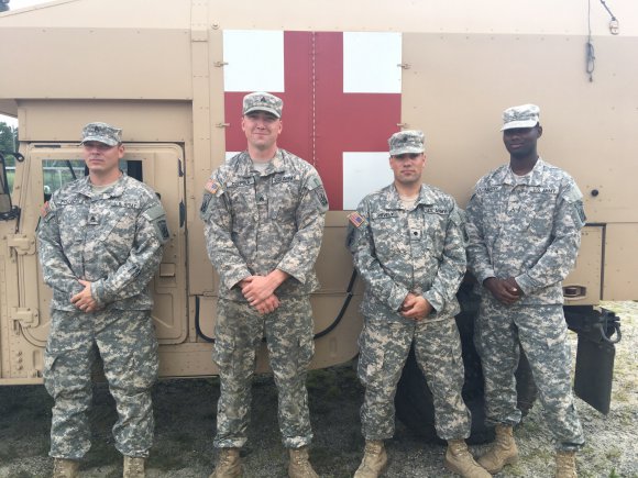 Photo by U.S. Army Staff Sgt. Steven Littlefield (from left) Massachusetts National Guard Soldiers Staff Sgt. Dana Francis