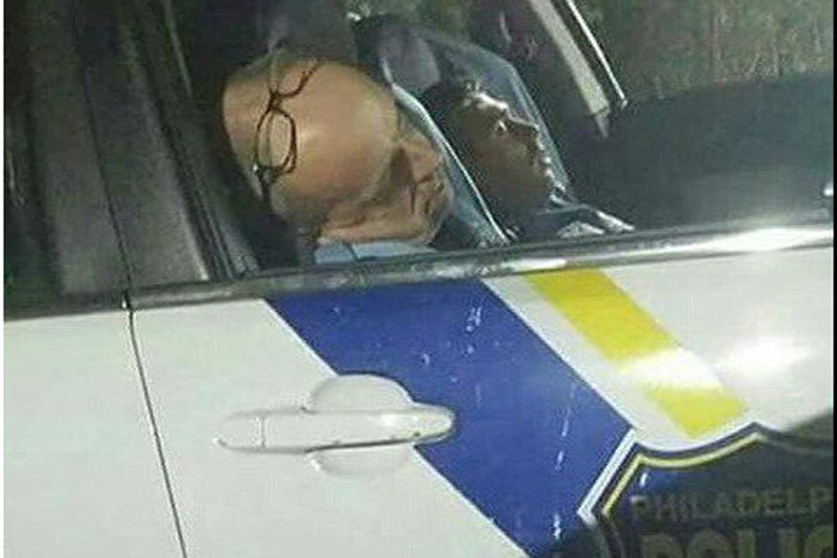  Twitter user @LuvonTop13 took this photo over the weekend of two officers who were sleeping while on duty in the Kensington area.  