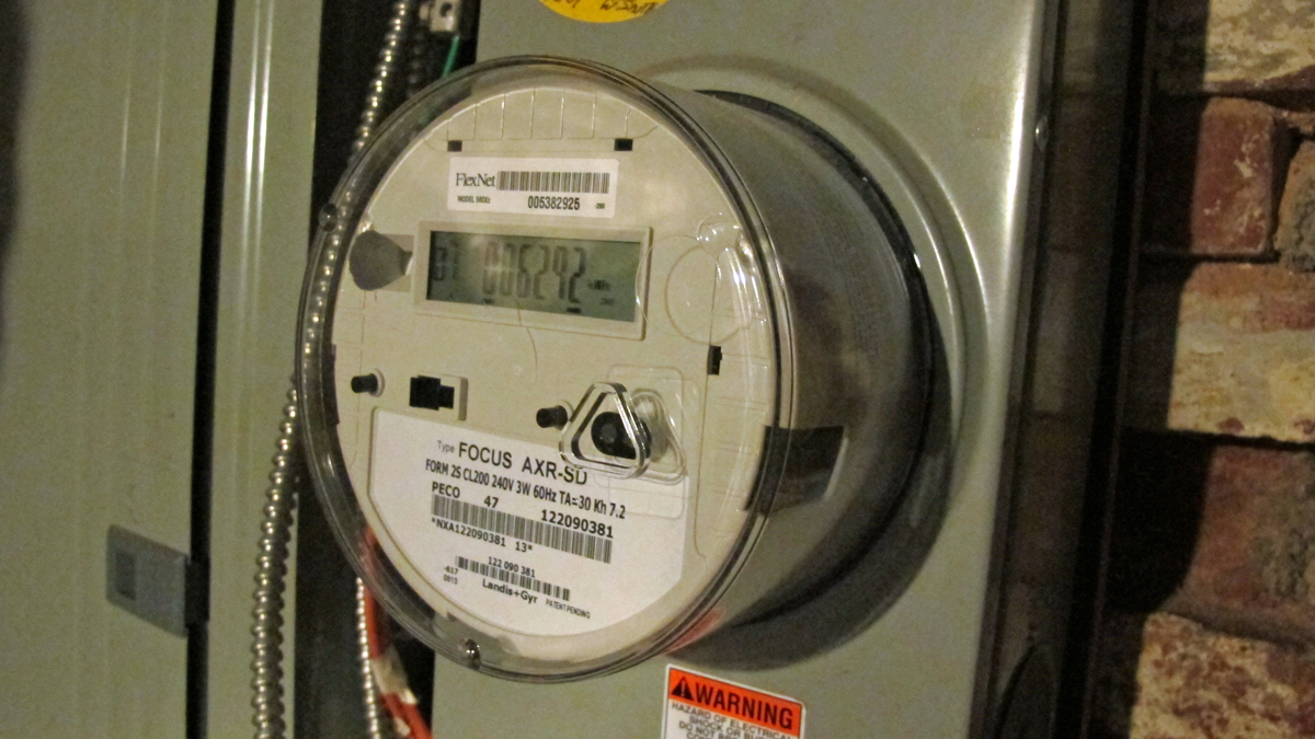 Krystal Eason's smart meter is mounted to the basement wall in her North Philadelphia home. The meter gives Eason and her utility more detailed information about her family's energy use. (Katie Colaneri/for The Pulse)
