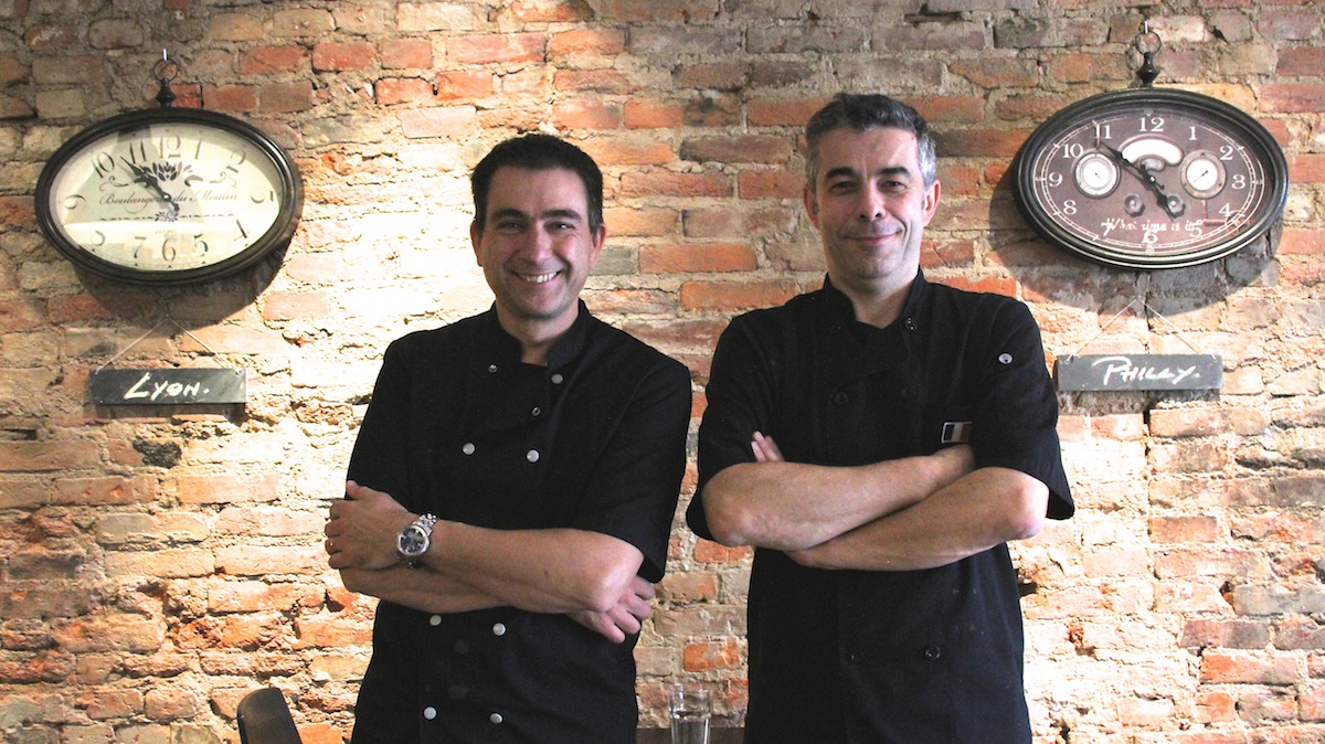 Frederic Elmalek (left) and Fabrice Gouette (right) college friends and co-owners of So Crepe are excited to open their new creperie in Manayunk. (Lauren Gruber/for NewsWorks)