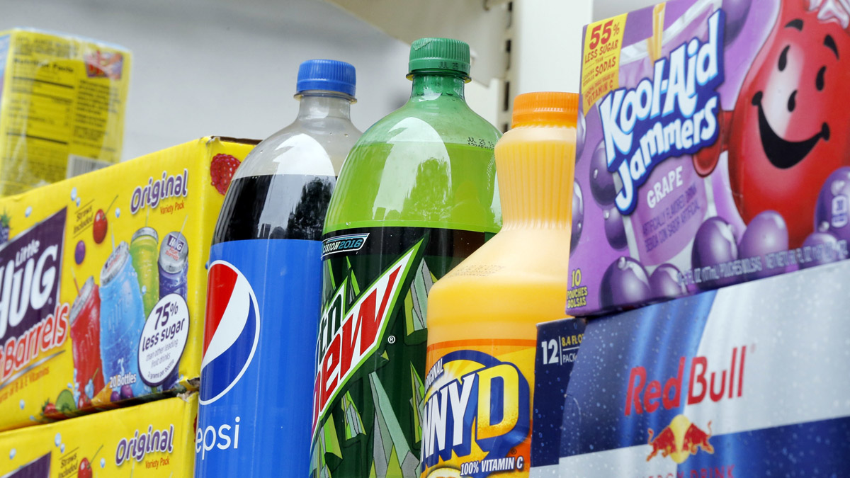 A delivery truck outside Independence Visitor Center on Sixth Street carries an ad against Philadelphia's proposed sugary drink tax. (Katie Colaneri/WHYY)
