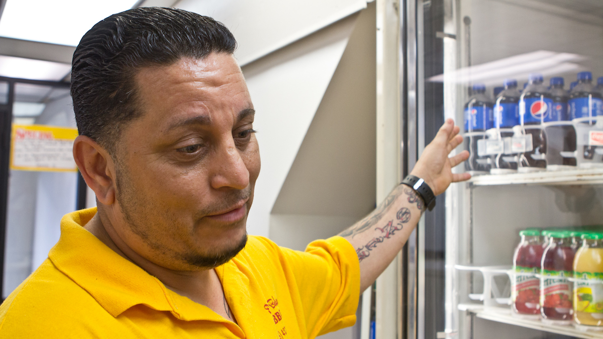 Carlos Rivera, a baker at Delicias Bakery on North 5th street said that he’s noticed an drop in the purchase of soda. (Kimberly Paynter/WHYY)