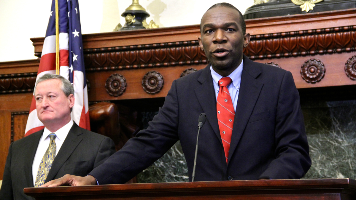  Philadelphia City Solicitor Sozi Tulante speaks with Mayor Jim Kenney at his side. (Emma Lee/WHYY) 
