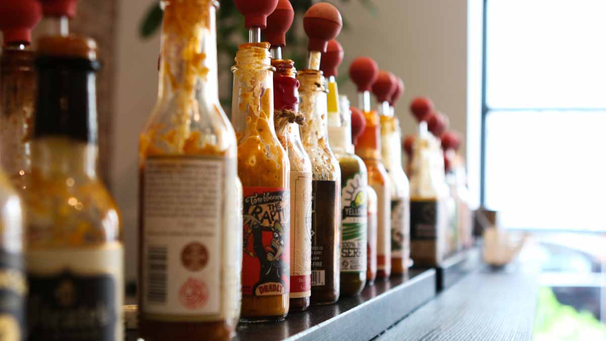 The concoctions inside these bottles are too potent to be gulped from a glass. (Joel Wolfram/for The Pulse)