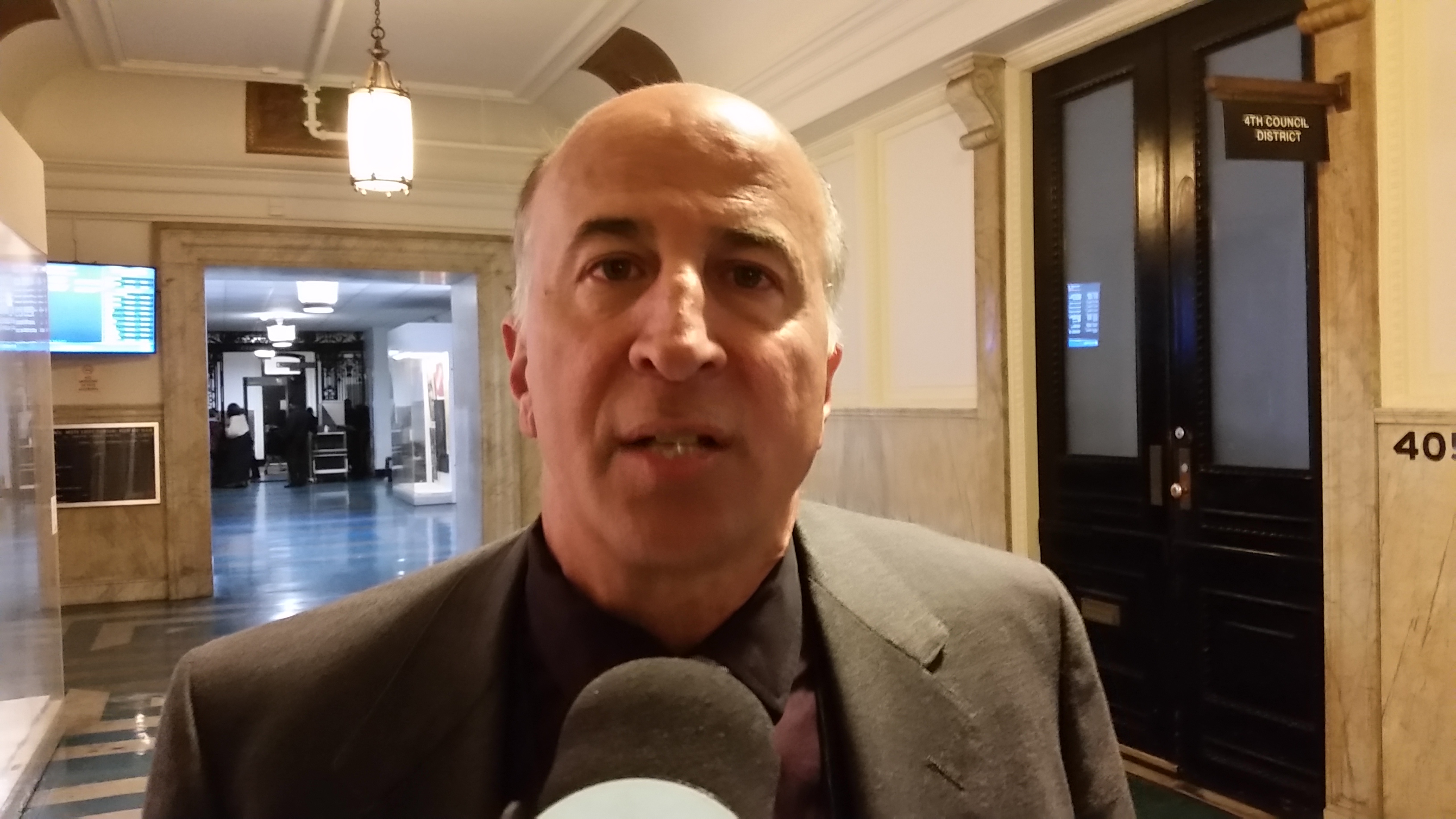  Councilman Mark Squilla supports a plan to charge city shoppers 5 cents for a plastic or paper bag. (Tom MacDonald/WHYY) 