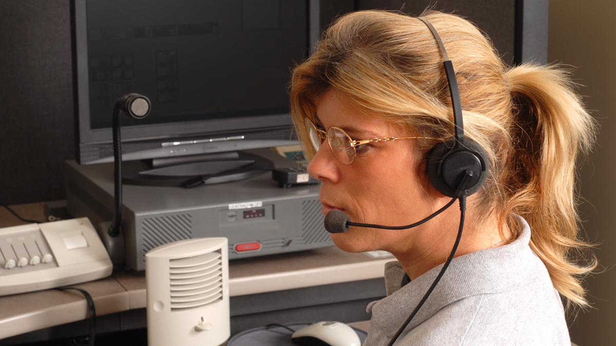  (<a href=“http://www.shutterstock.com/pic-3186272/stock-photo-a-police-dispatcher-sitting-at-a-dispatch-console.html?src=f5A8d64JsY4qEV8_CxRZSg-1-2”>Photo</a> via ShutterStock)  