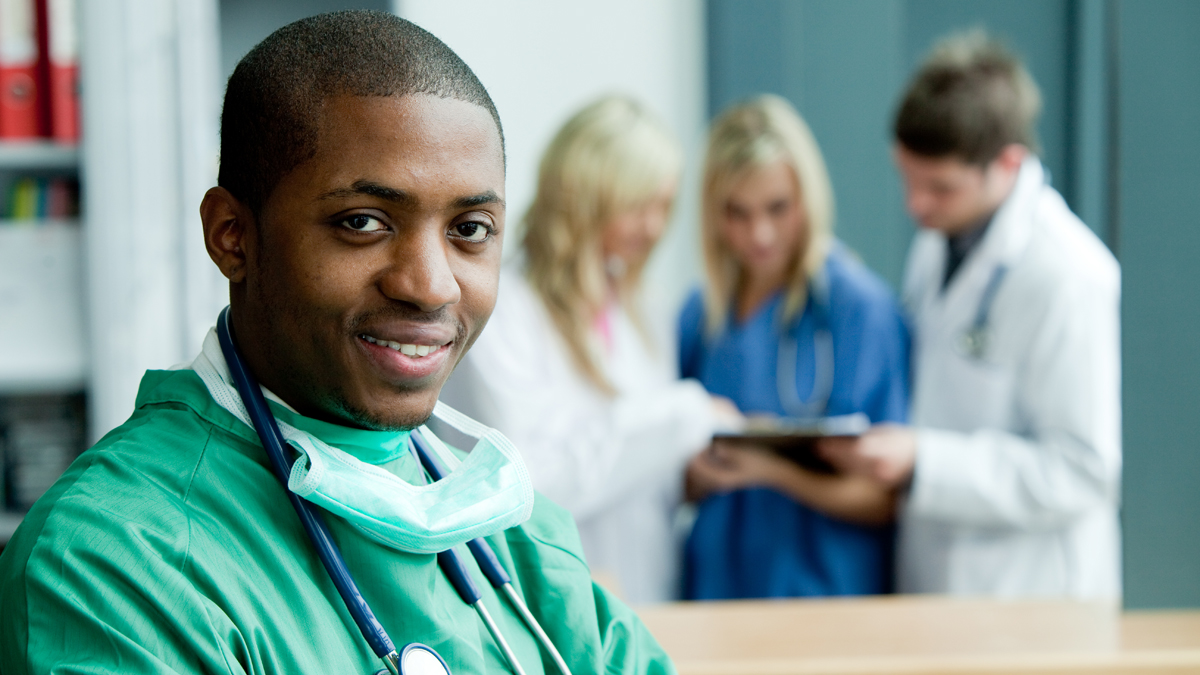  (<a href=“http://www.shutterstock.com/pic-37147468/stock-photo-portrait-of-an-afro-american-surgeon-with-folded-arms-smiling-at-the-camera.html?src=ceSaIMOavaDokxOtc6LRWg-2-73”>Photo</a> via ShutterStock) 