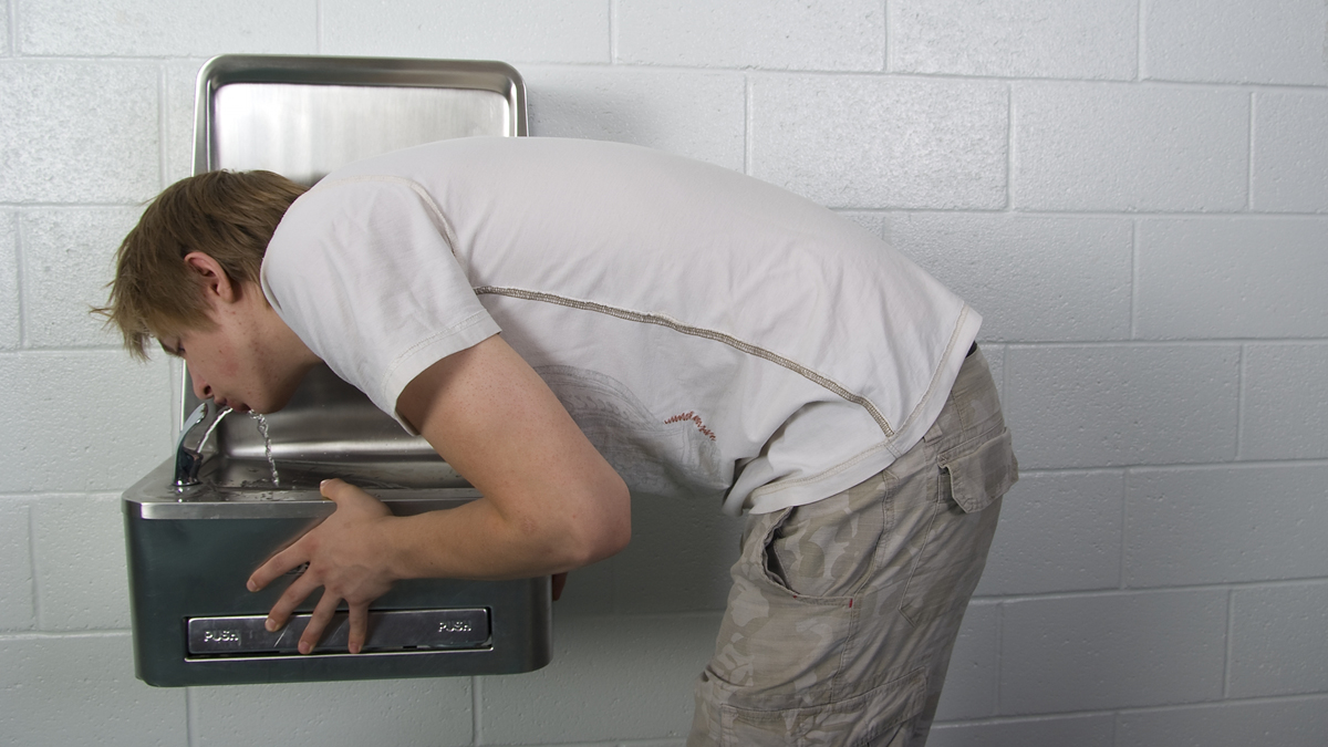  (<a href=“http://www.shutterstock.com/pic-32979787/stock-photo-male-student-drinks-from-school-water-fountain.html?src=IThl-DfjNTarQRA4L8x6iw-1-3”>Photo</a> via ShutterStock) 