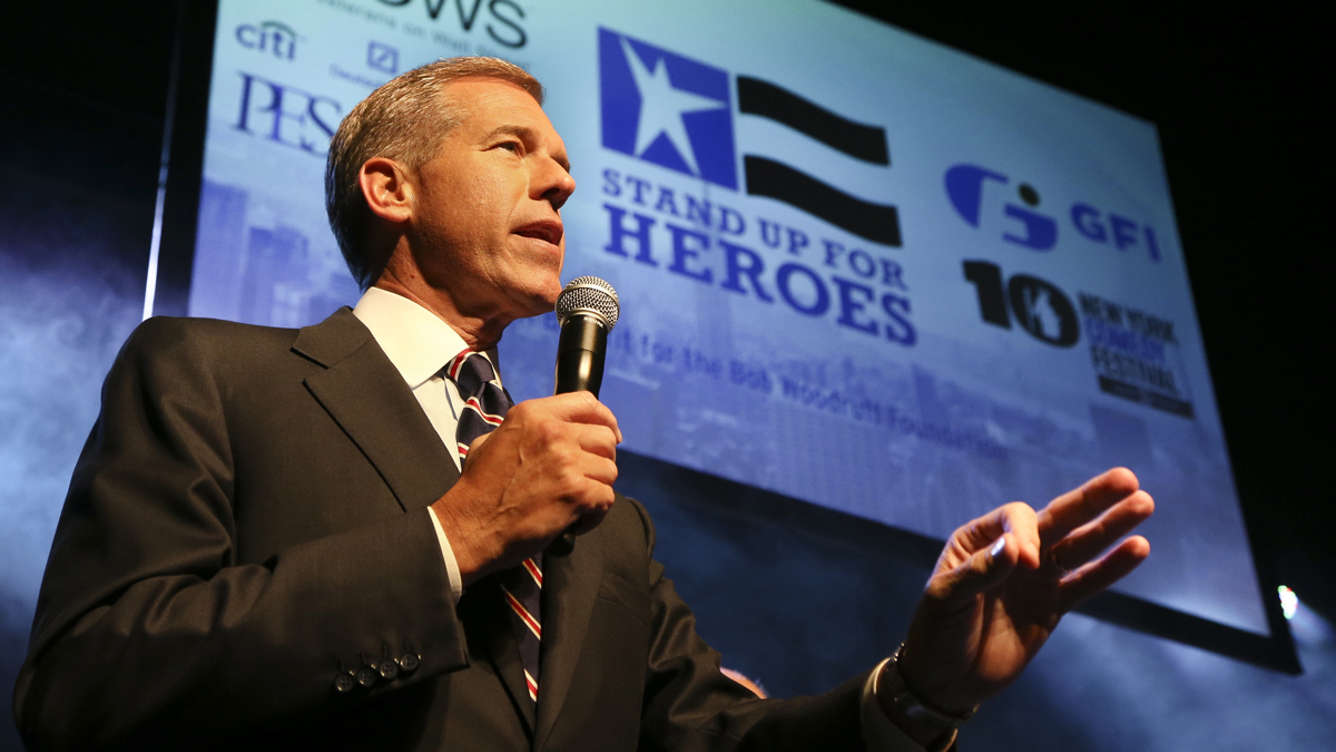  NBC News anchor Brian Williams speaks to the audience at the Stand Up for Heroes event at Madison Square Garden in 2013. (John Minchillo/InvisionAP) 