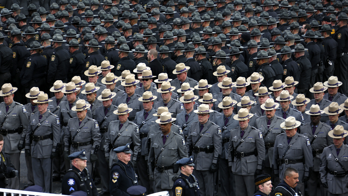 File image of Pennsylvania State Troopers line up outside the Blair County Convention Center in Altoona. (AP image)