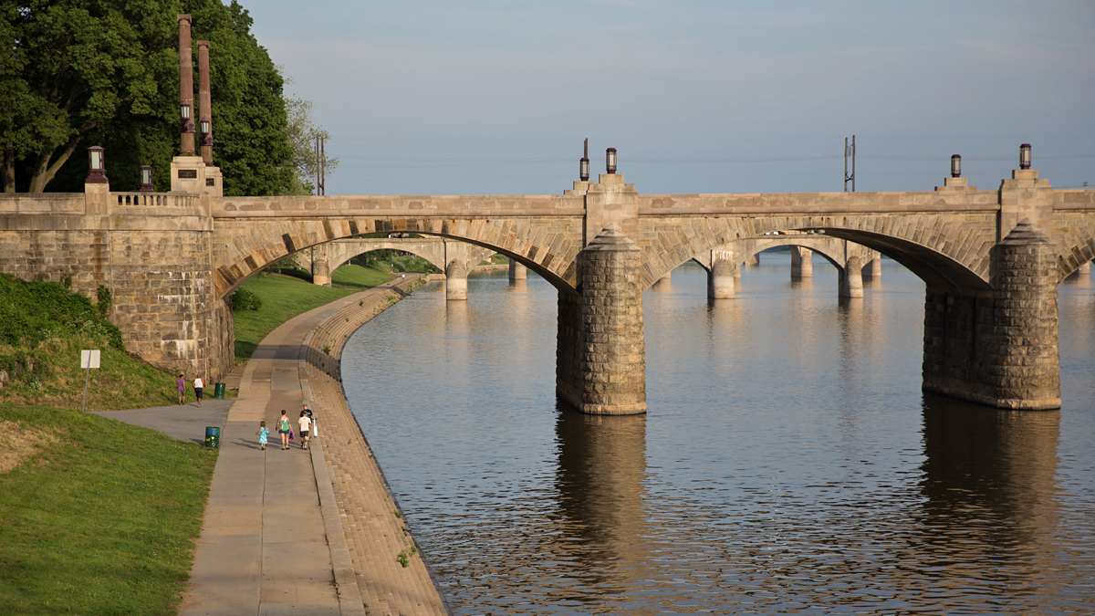  People walk along the Susquehanna River in Harrisburg, Pennsylvania.  (Lindsay Lazarski/WHYY) 