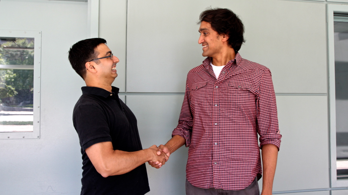 Science communicator Neil Bardhan (left) meets with Haverford College astronomer Desika Narayanan. (Kimberly Paynter/WHYY)