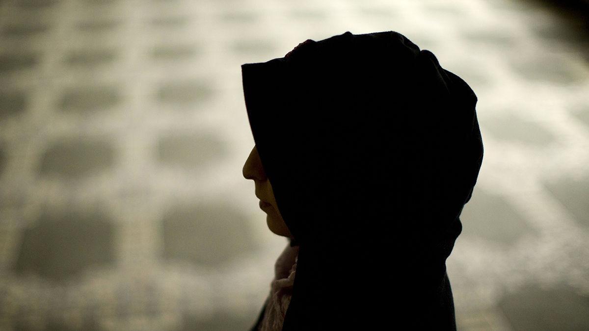  A Syrian refugee, who agreed to be photographed on condition of anonymity because of fear of retaliation against family living in Syria, poses for a portrait at the Muslim Association of Lehigh Valley in Whitehall, Pa. (AP Photo/Matt Rourke) 