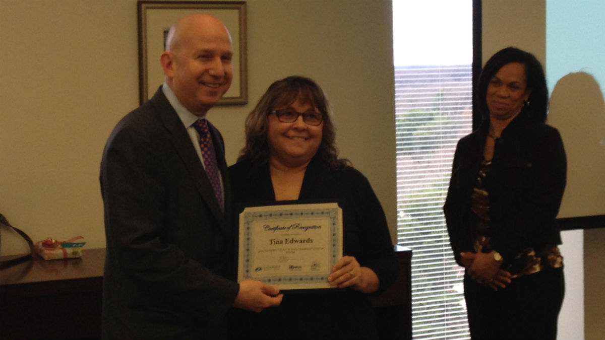  Early childhood educator Tina Edwards (center) poses with Governor Jack Markell (left). (Avi Wolfman-Arent, NewsWorks/WHYY) 