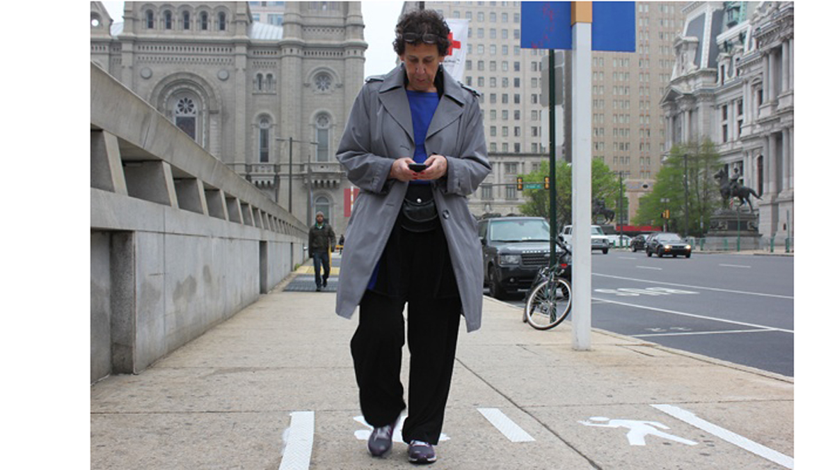  Rina Cutler, deputy mayor for transportation and utilities checks her phone in the first ever 
