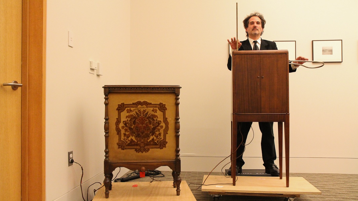 Mano Divina plays a rare theremin at the Franklin Institute. Only 500 were built in 1929 and are based on the original design by Leon Theremin. (Kimberly Paynter/WHYY)