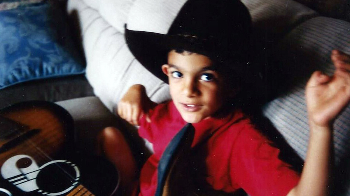  Tony Abraham knew from an early age that he would have to dress the part to be considered 'American.' He is shown here at age 4. 'All that's missing from this photo is a raggedy dog and a T-Bone steak,' he says. 